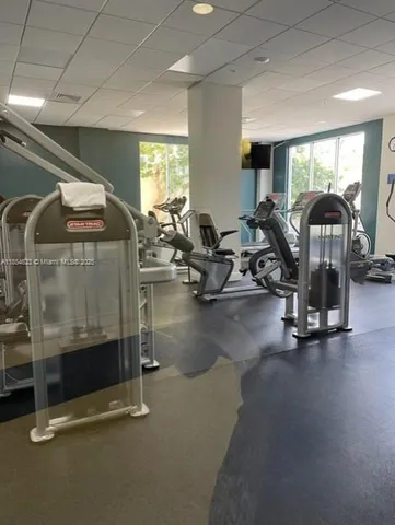 a gym room with gym equipment