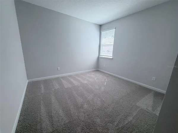 a view of small space with wooden floor