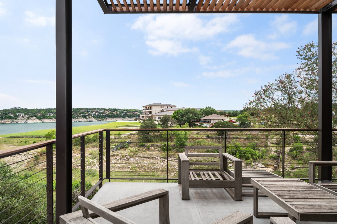 1101 Ivean Pearson Road, Unit E201 Leander, TX 78645 - Photo 10 of 20 a view of a balcony with lake view and mountain view
