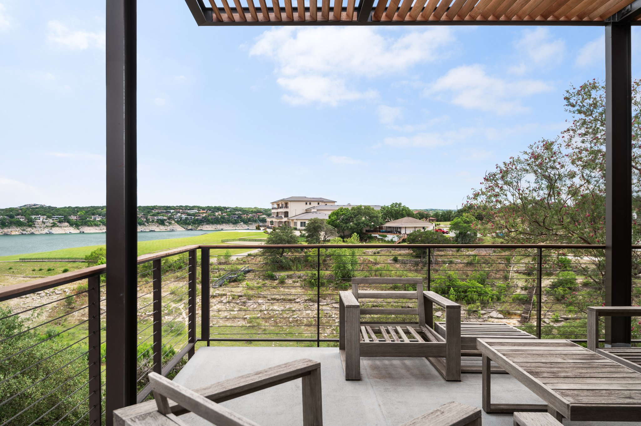1101 Ivean Pearson Road, Unit E201 Leander, TX 78645 - Photo 10 of 20 Balcony with a water view