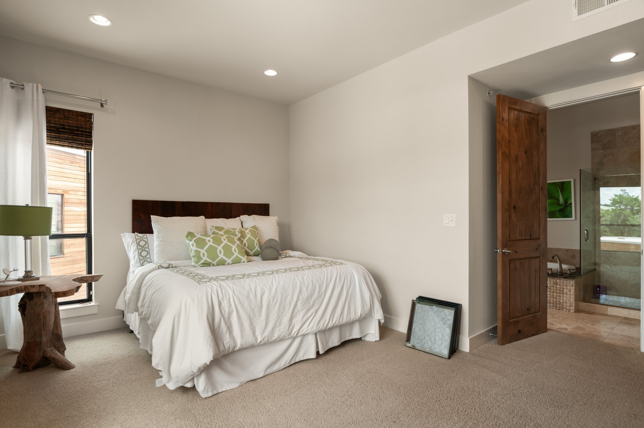 1101 Ivean Pearson Road, Unit E201 Leander, TX 78645 - Photo 12 of 20 Bedroom with light carpet, recessed lighting, and baseboards
