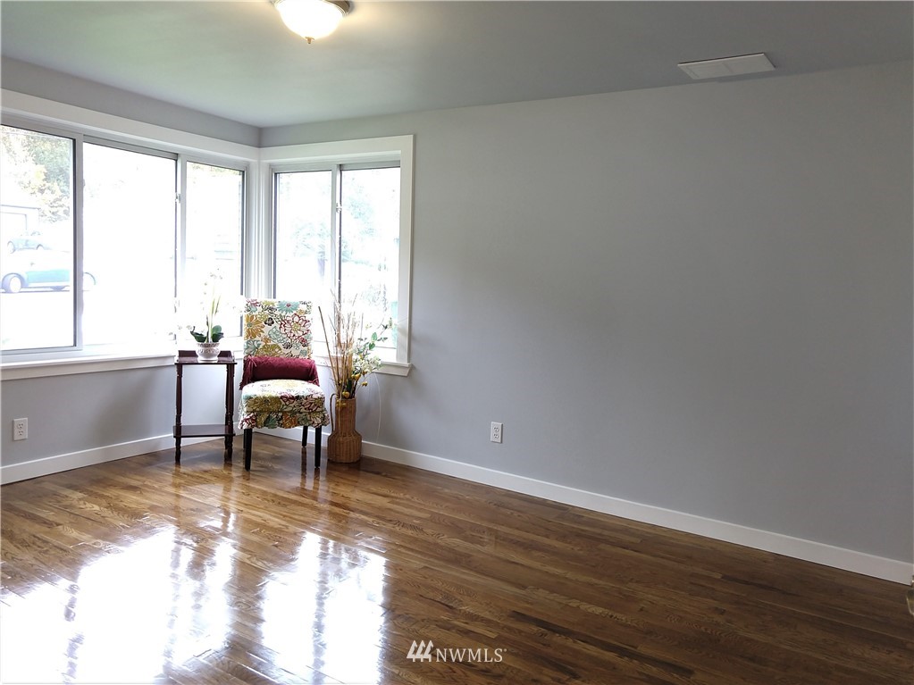 3201 Southeast 5th Street Renton, WA 98058 - Photo 11 of 17 a living room with a large window