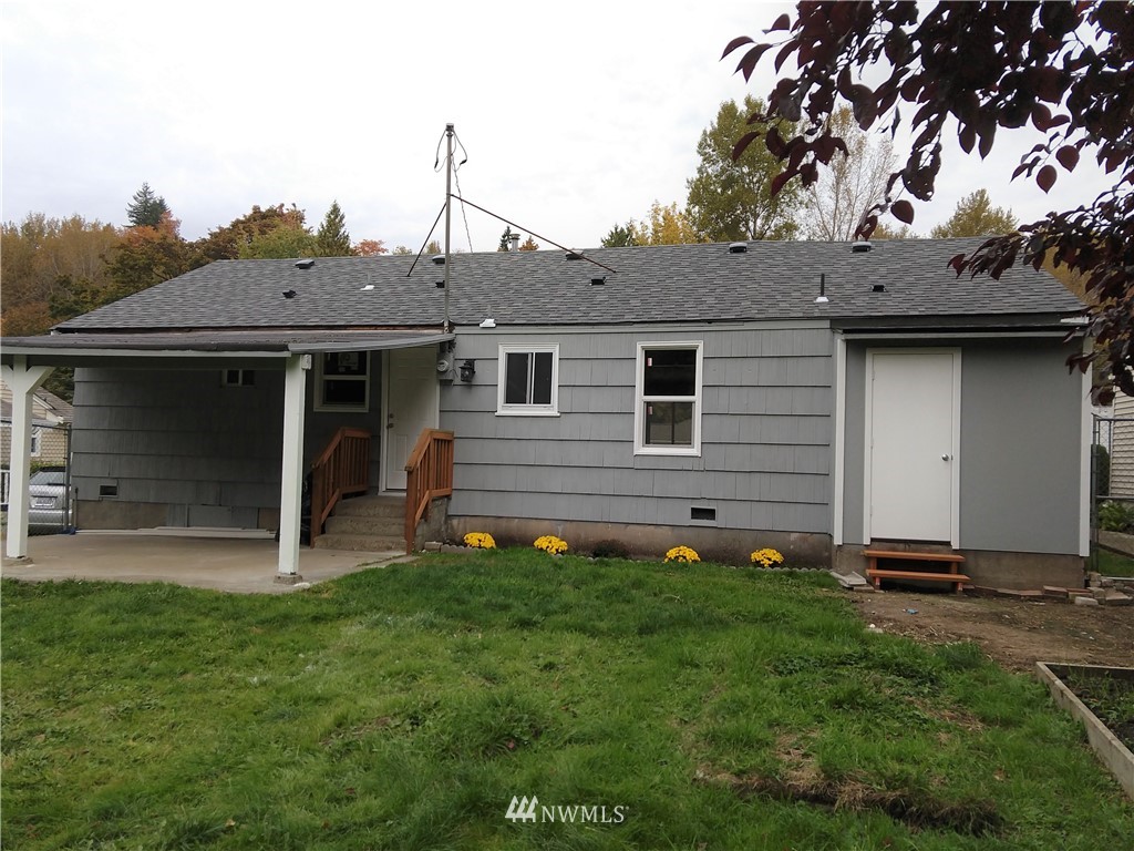 3201 Southeast 5th Street Renton, WA 98058 - Photo 15 of 17 a view of a house with a yard