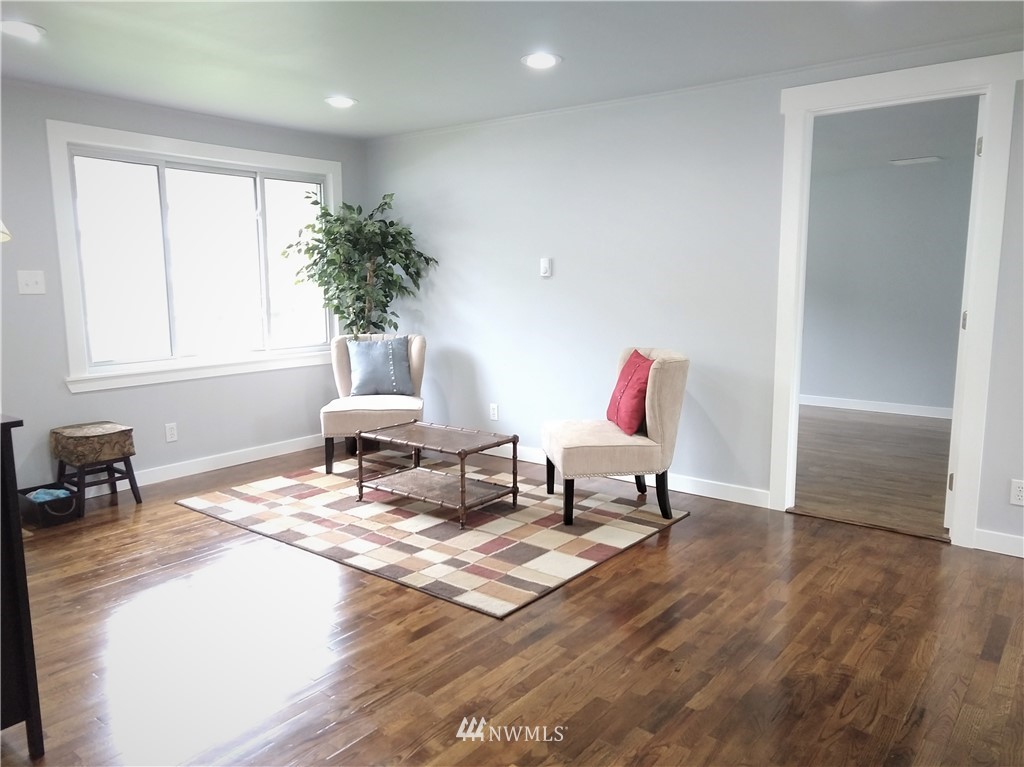 3201 Southeast 5th Street Renton, WA 98058 - Photo 6 of 17 a living room with furniture and a potted plant