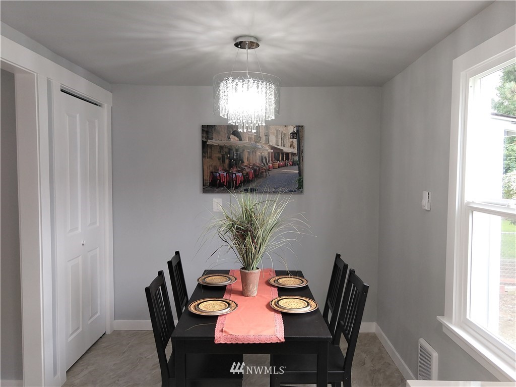 3201 Southeast 5th Street Renton, WA 98058 - Photo 9 of 17 a view of a dining room with furniture and window