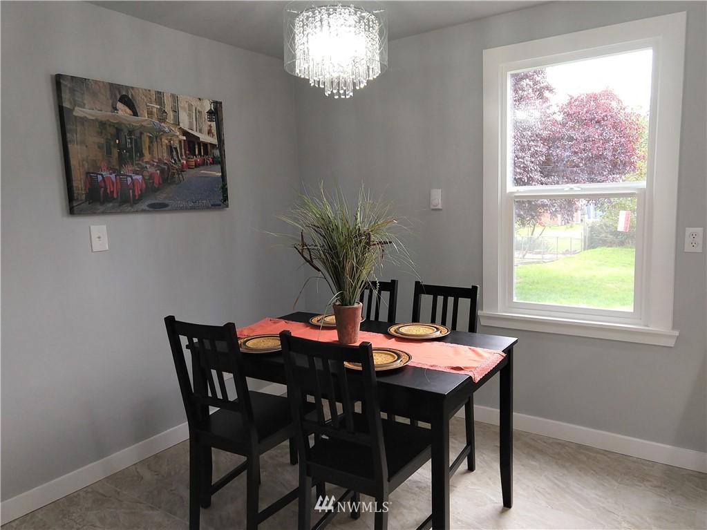 3201 Southeast 5th Street Renton, WA 98058 - Photo 10 of 17 a view of a dining room with furniture window and outside view
