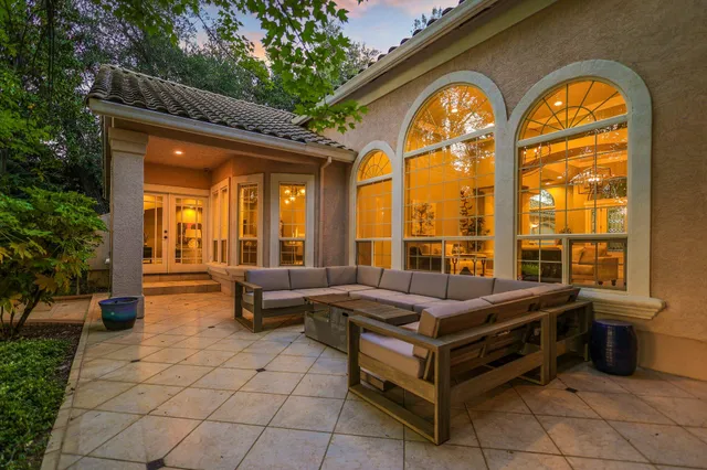 a building outdoor space with swimming pool and furniture