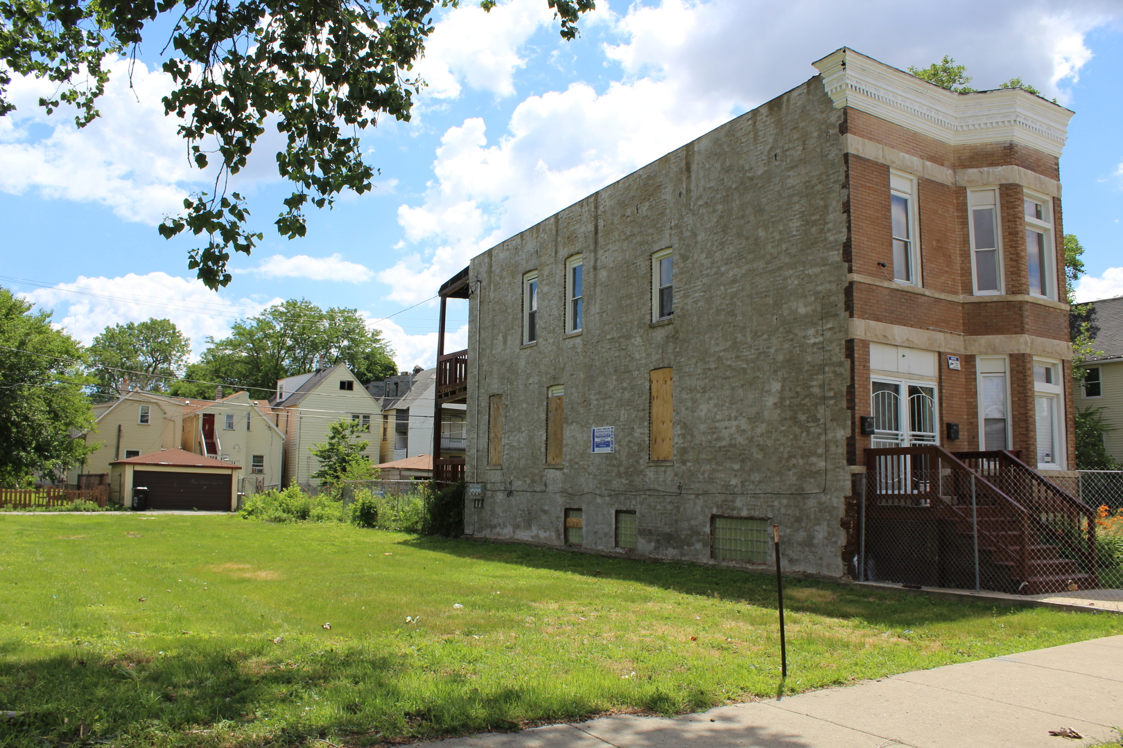 a backyard of a house with lots of green space