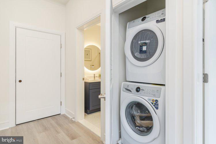 4550 Mitchell Street, Unit 208 Philadelphia, PA 19128 - Photo 12 of 25 a utility room with dryer and washer