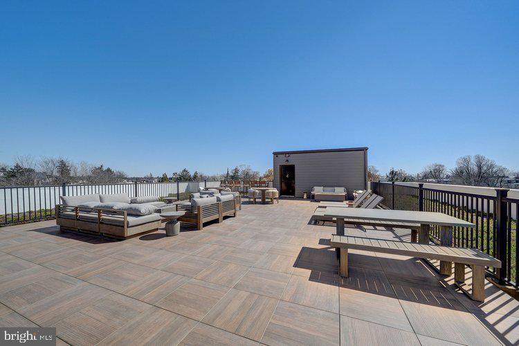4550 Mitchell Street, Unit 208 Philadelphia, PA 19128 - Photo 15 of 25 a view of a terrace with seating area