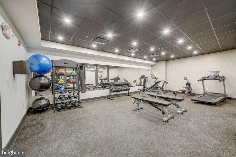 4550 Mitchell Street, Unit 208 Philadelphia, PA 19128 - Photo 20 of 25 a view of a room with gym equipment