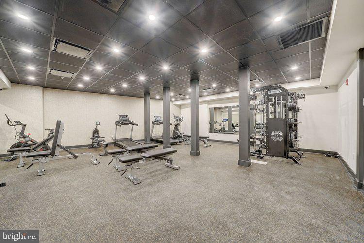 4550 Mitchell Street, Unit 208 Philadelphia, PA 19128 - Photo 21 of 25 a view of a room with gym equipment
