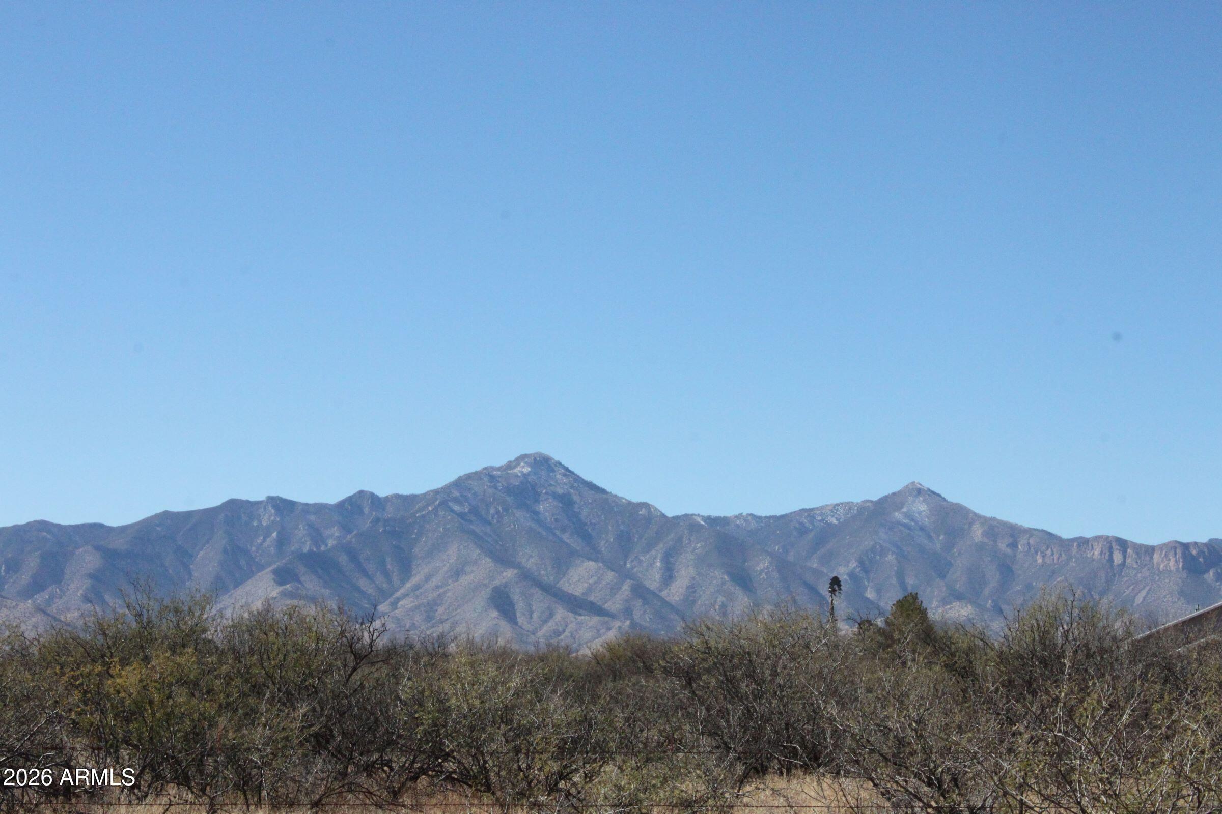 9073 South O'Neil Road Hereford, AZ 85615 - Photo 6 of 7 a view of a mountain range with top of it