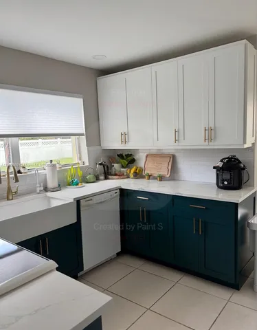 a kitchen with stainless steel appliances granite countertop a refrigerator sink and cabinets