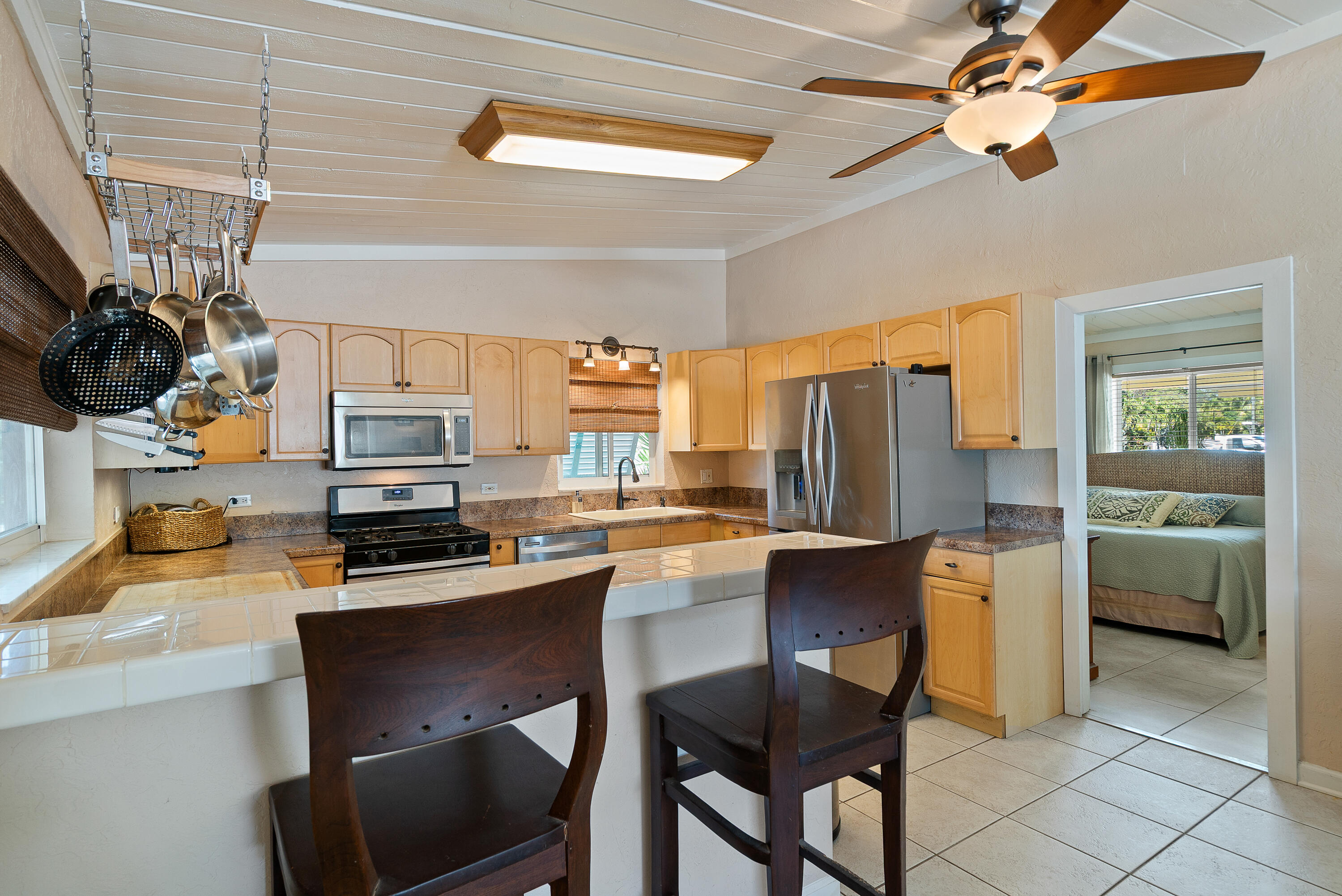 412 3rd Street Key Largo, FL 33037 - Photo 12 of 41 a kitchen with appliances cabinets and furniture