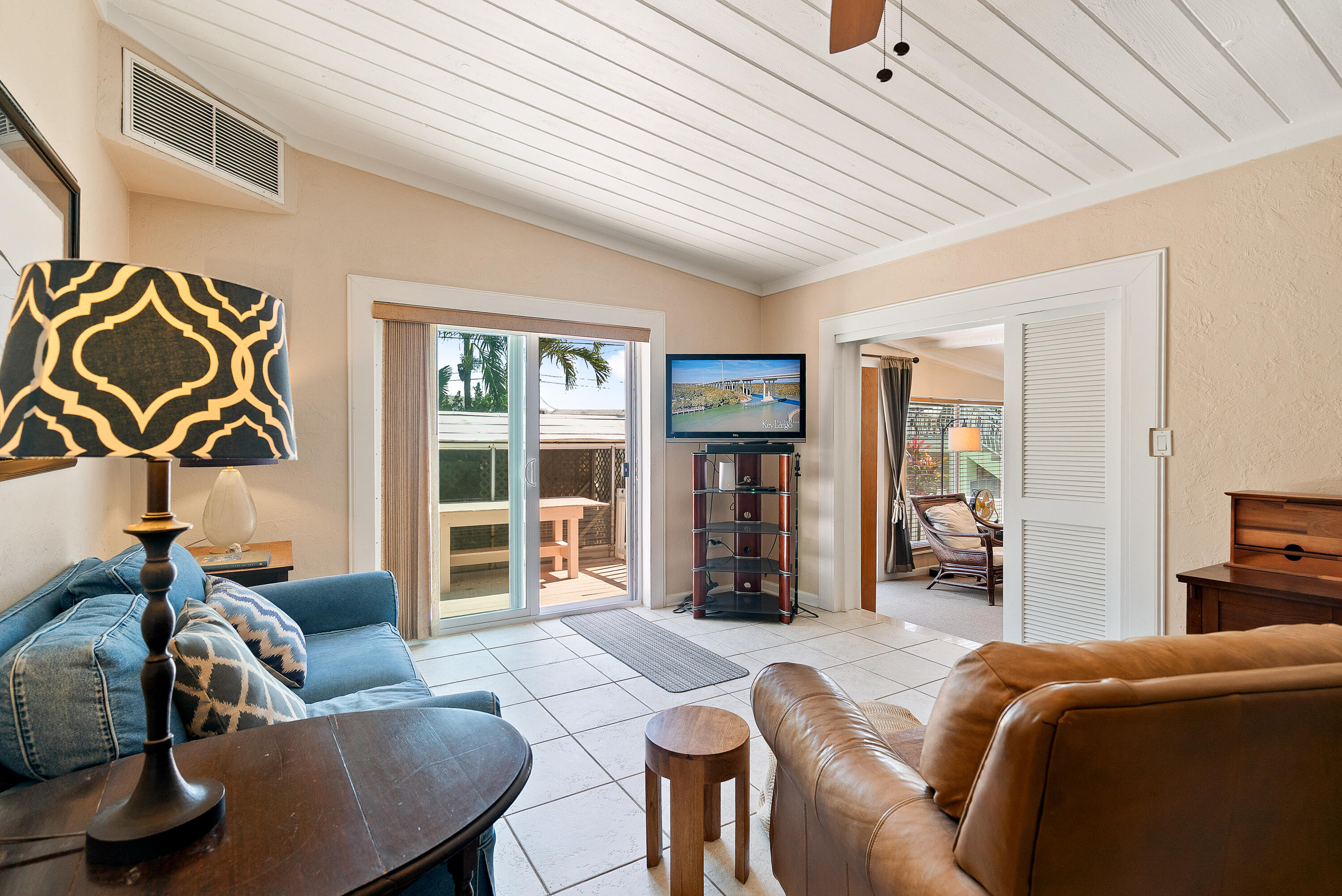 412 3rd Street Key Largo, FL 33037 - Photo 16 of 41 a living room with furniture and a window