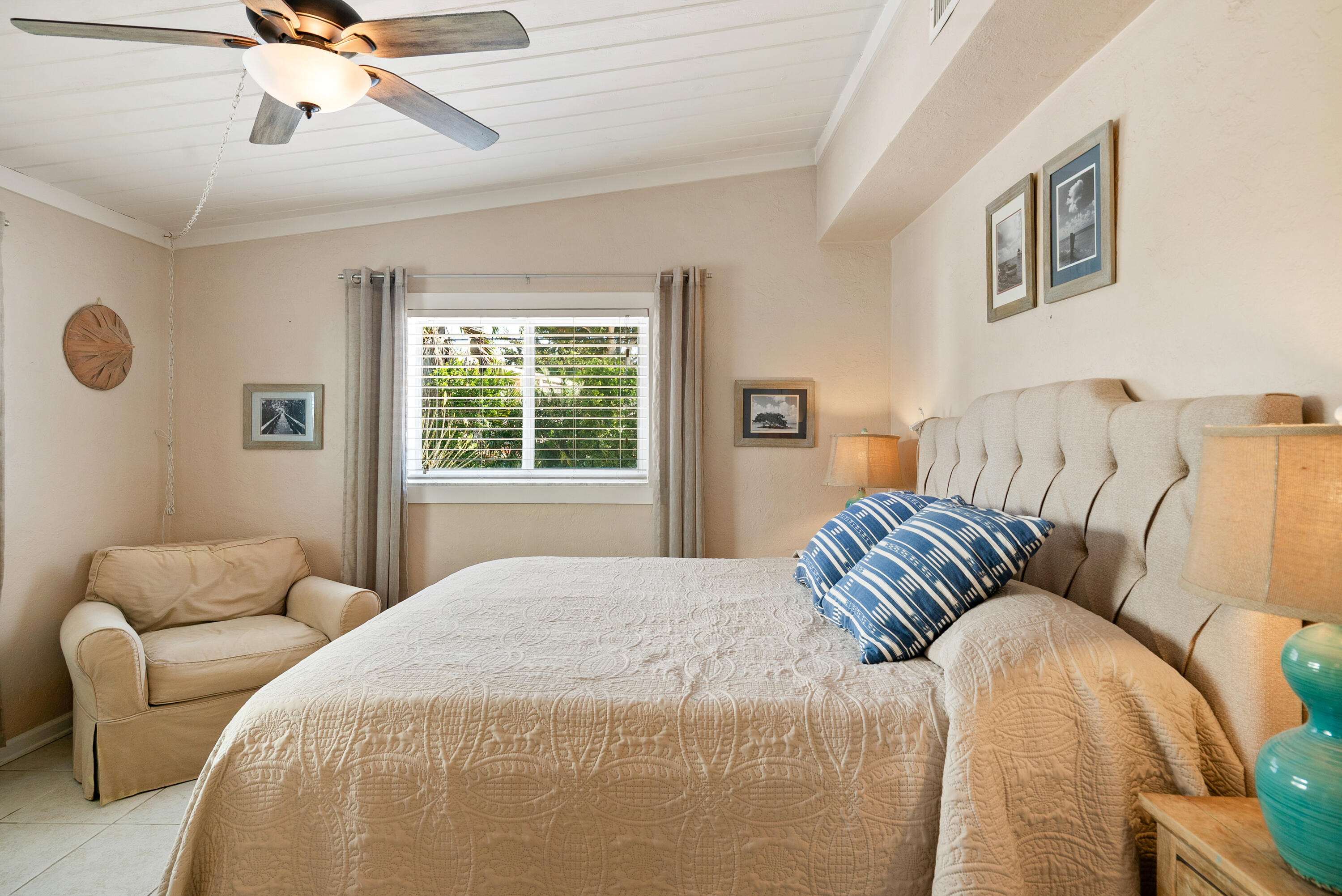 412 3rd Street Key Largo, FL 33037 - Photo 18 of 41 a bedroom with a bed and window