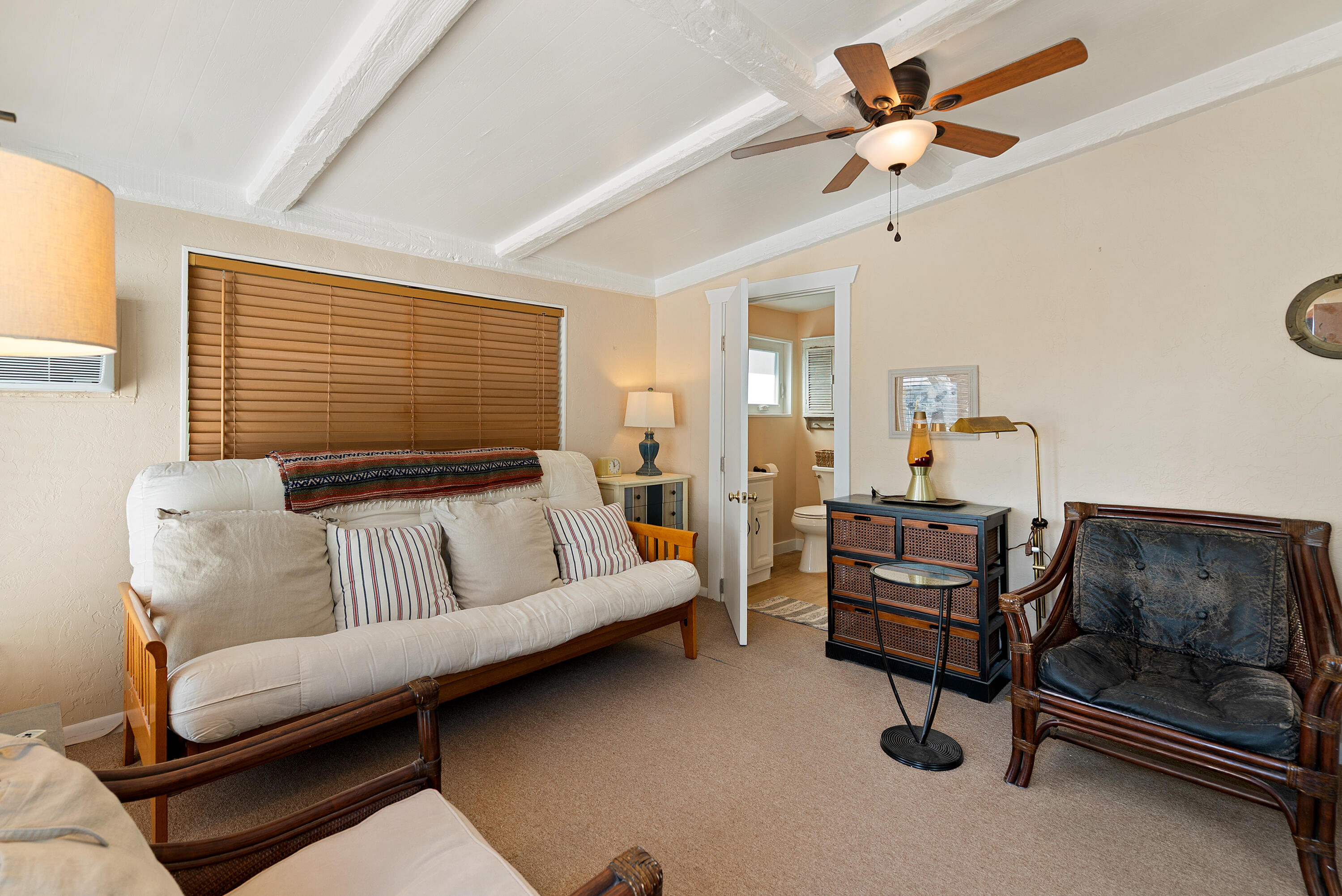 412 3rd Street Key Largo, FL 33037 - Photo 19 of 41 a living room with furniture and a flat screen tv