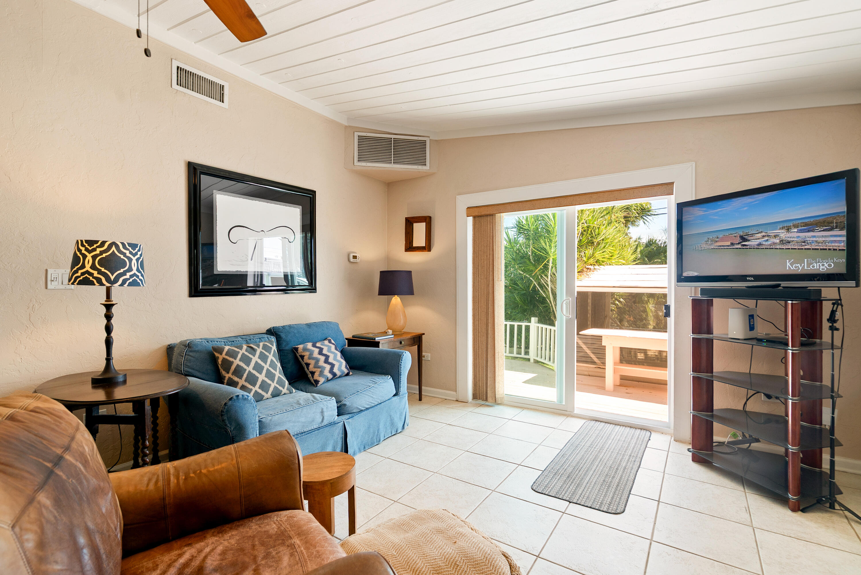 412 3rd Street Key Largo, FL 33037 - Photo 23 of 41 a living room with furniture and a window