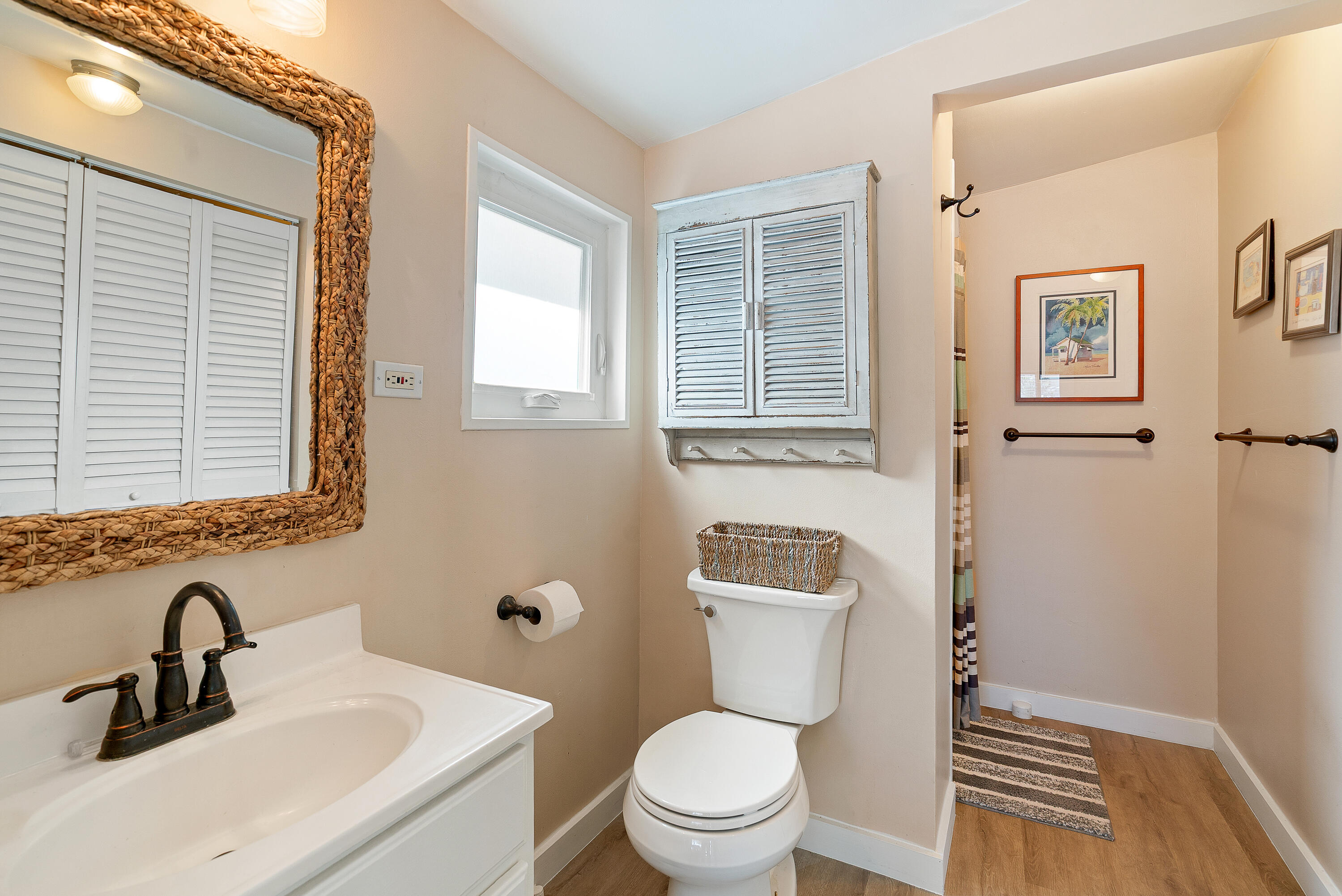 412 3rd Street Key Largo, FL 33037 - Photo 22 of 41 a bathroom with a sink a toilet and a window
