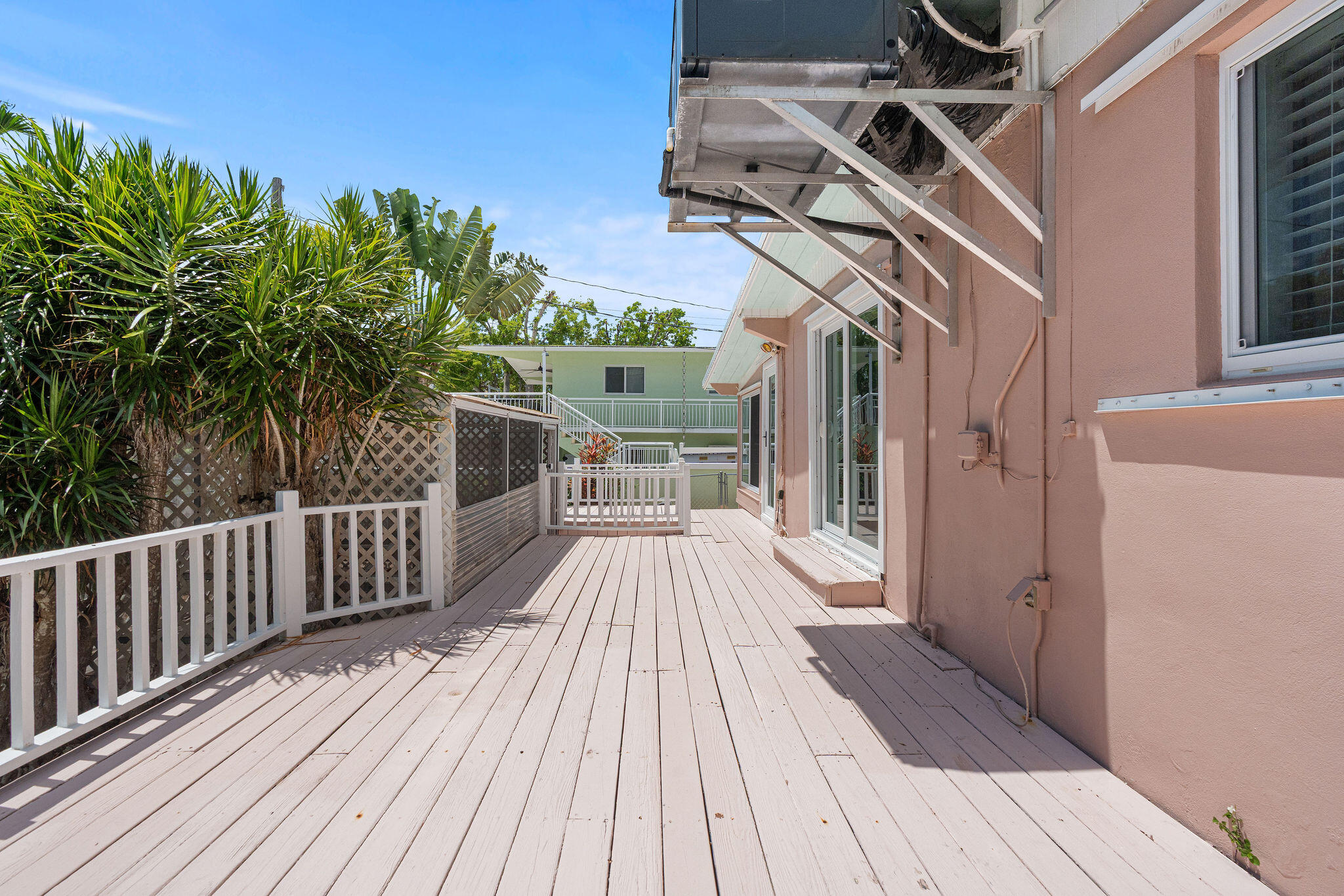 412 3rd Street Key Largo, FL 33037 - Photo 25 of 41 a view of a balcony with wooden floor