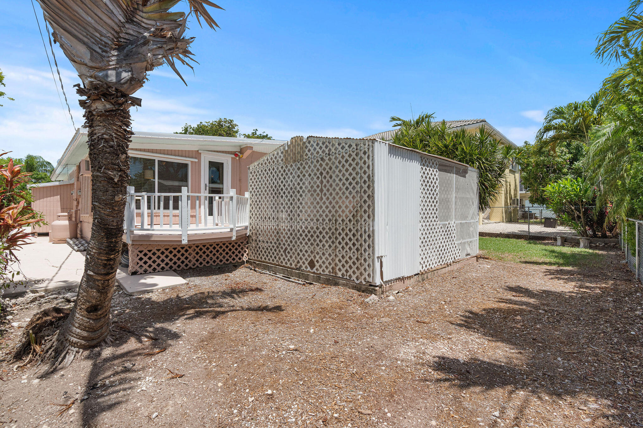 412 3rd Street Key Largo, FL 33037 - Photo 28 of 41 a view of a house with a yard and tree