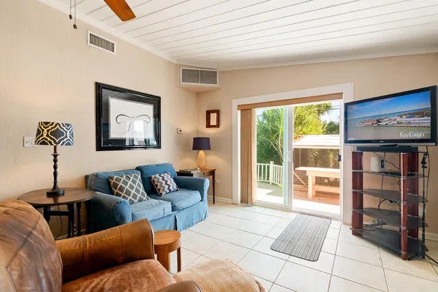 a view of a wooden deck with a patio