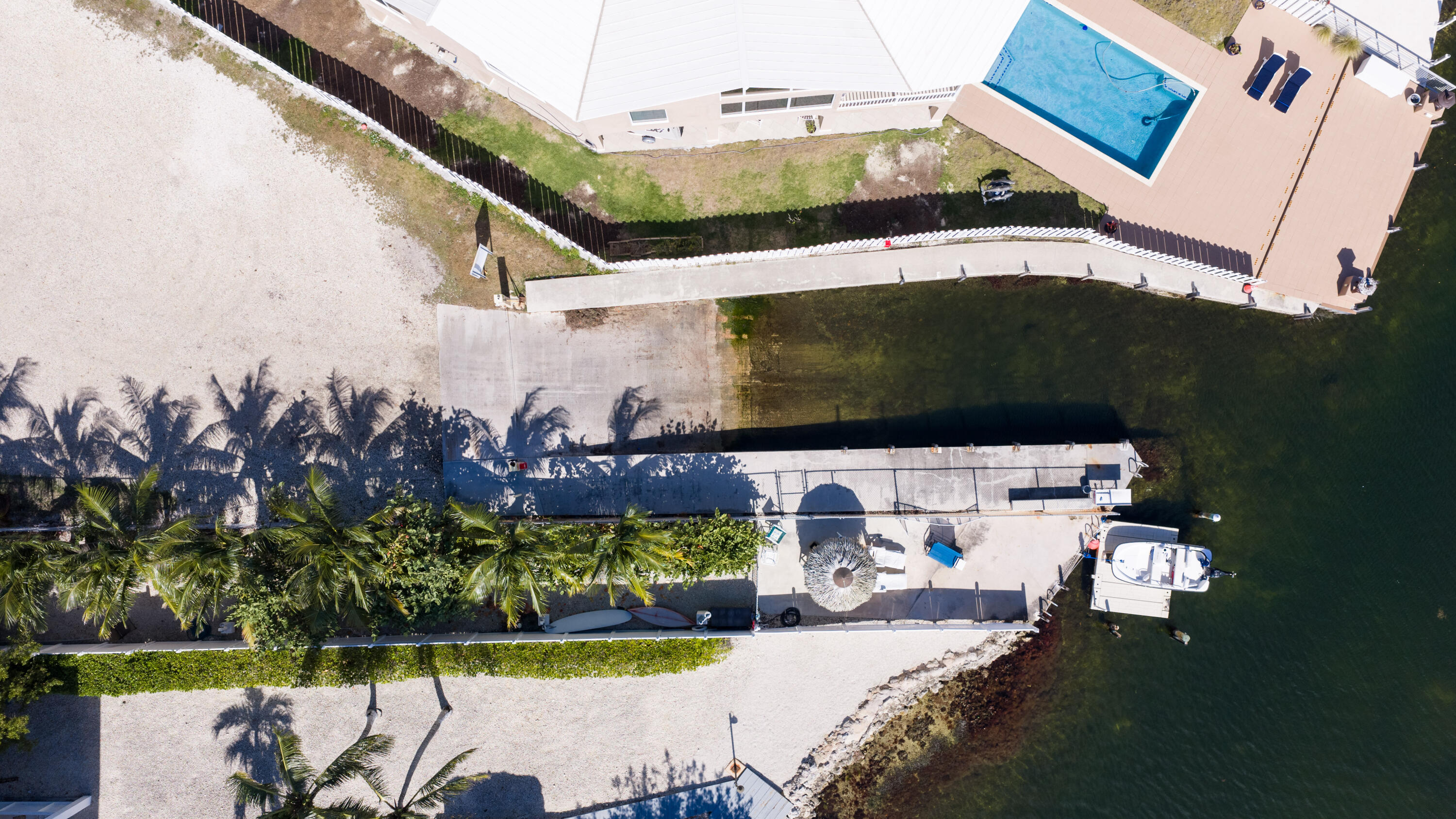 412 3rd Street Key Largo, FL 33037 - Photo 9 of 41 a picture of a table and chairs