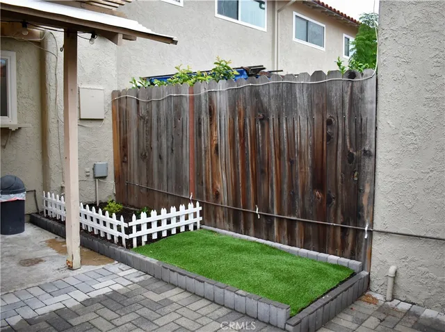 a view of a wooden fence