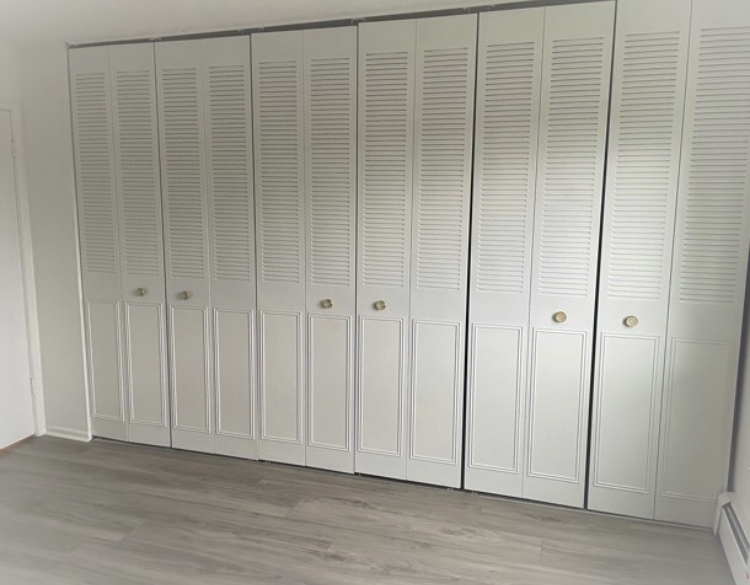 3523 Central Road, Unit 302 Glenview, IL 60025 - Photo 7 of 8 a view of an empty room with wooden floor