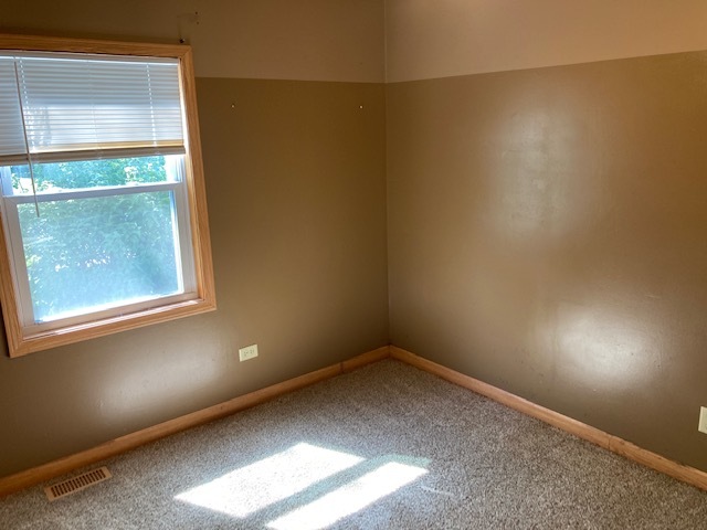 22201 Rockingham Road Richton Park, IL 60471 - Photo 14 of 18 an empty room with a window