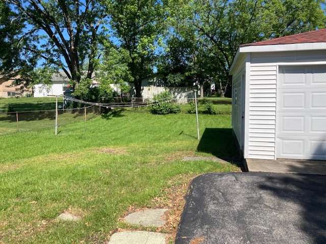 22201 Rockingham Road Richton Park, IL 60471 - Photo 17 of 18 a view of a backyard with a small cabin