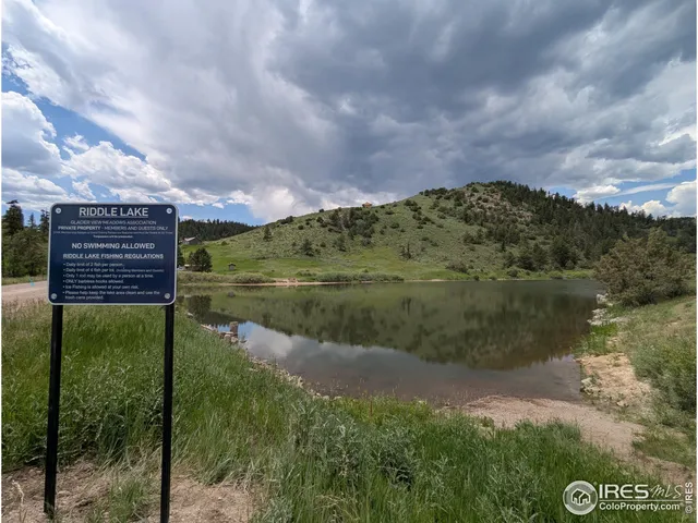 a view of a lake with a big yard