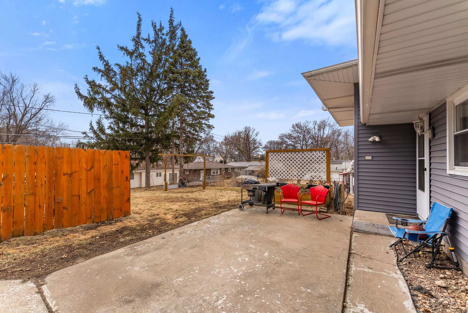 1135 5th Avenue North Clinton, IA 52732 - Photo 20 of 22 a backyard of a house with fire pit and couches
