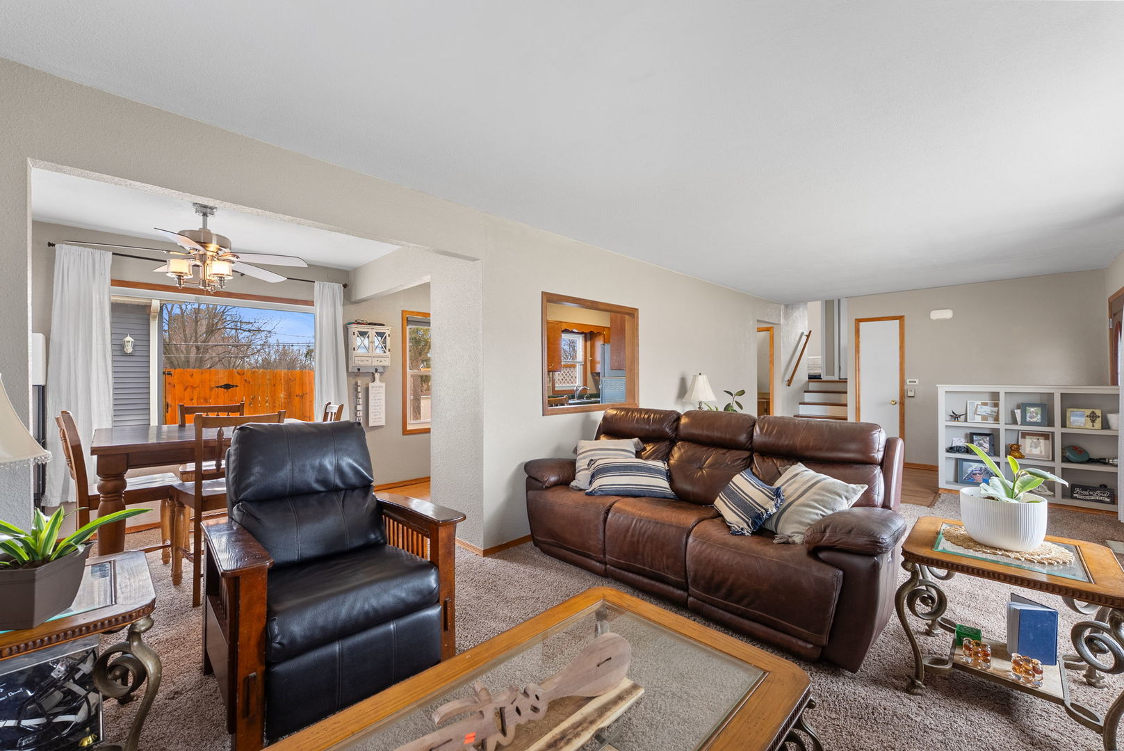 1135 5th Avenue North Clinton, IA 52732 - Photo 6 of 22 a living room with furniture and a dining table