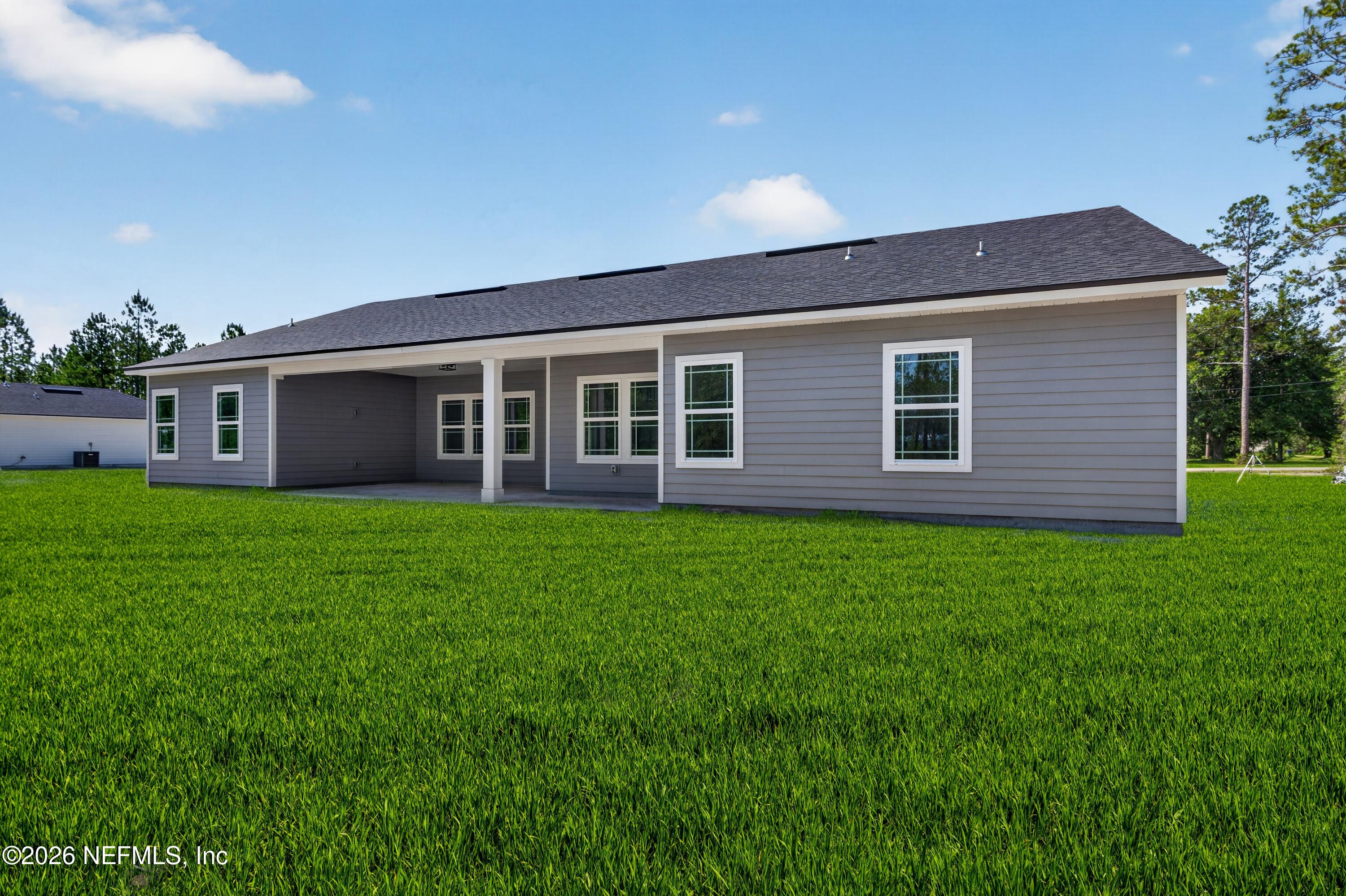 4362 Angora Street Middleburg, FL 32068 - Photo 29 of 31 a view of an house that has garden