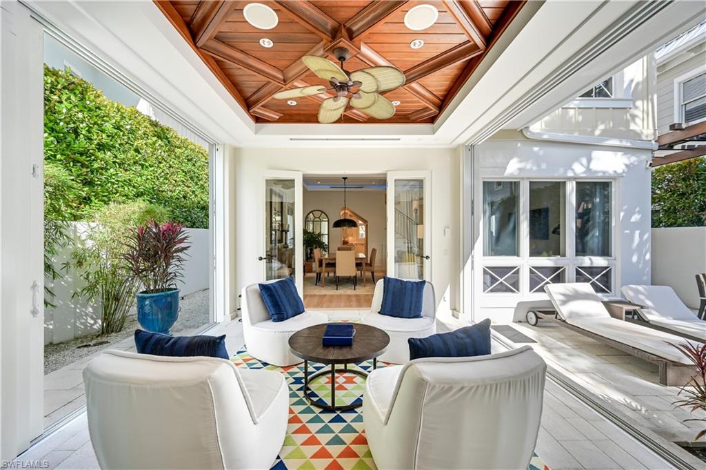 42 6th Street South Naples, FL 34102 - Photo 14 of 46 View of patio / terrace with a ceiling fan