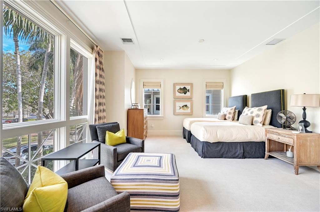 42 6th Street South Naples, FL 34102 - Photo 40 of 46 Bedroom with carpet and baseboards