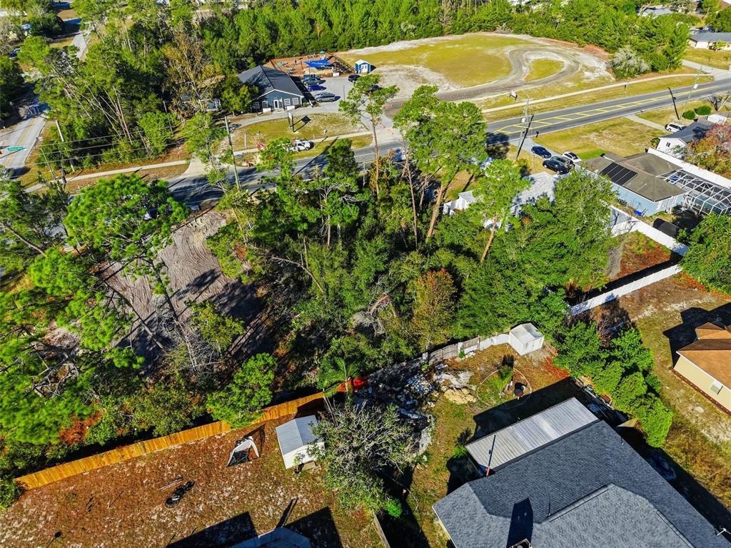 0 Deltona Boulevard Spring Hill, FL 34608 - Photo 5 of 7 a view of a swimming pool with a yard