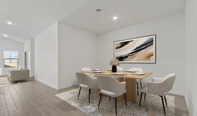a view of kitchen with stainless steel appliances granite countertop refrigerator sink and stove