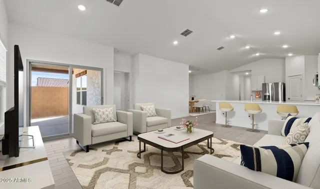 a view of a dining room with furniture