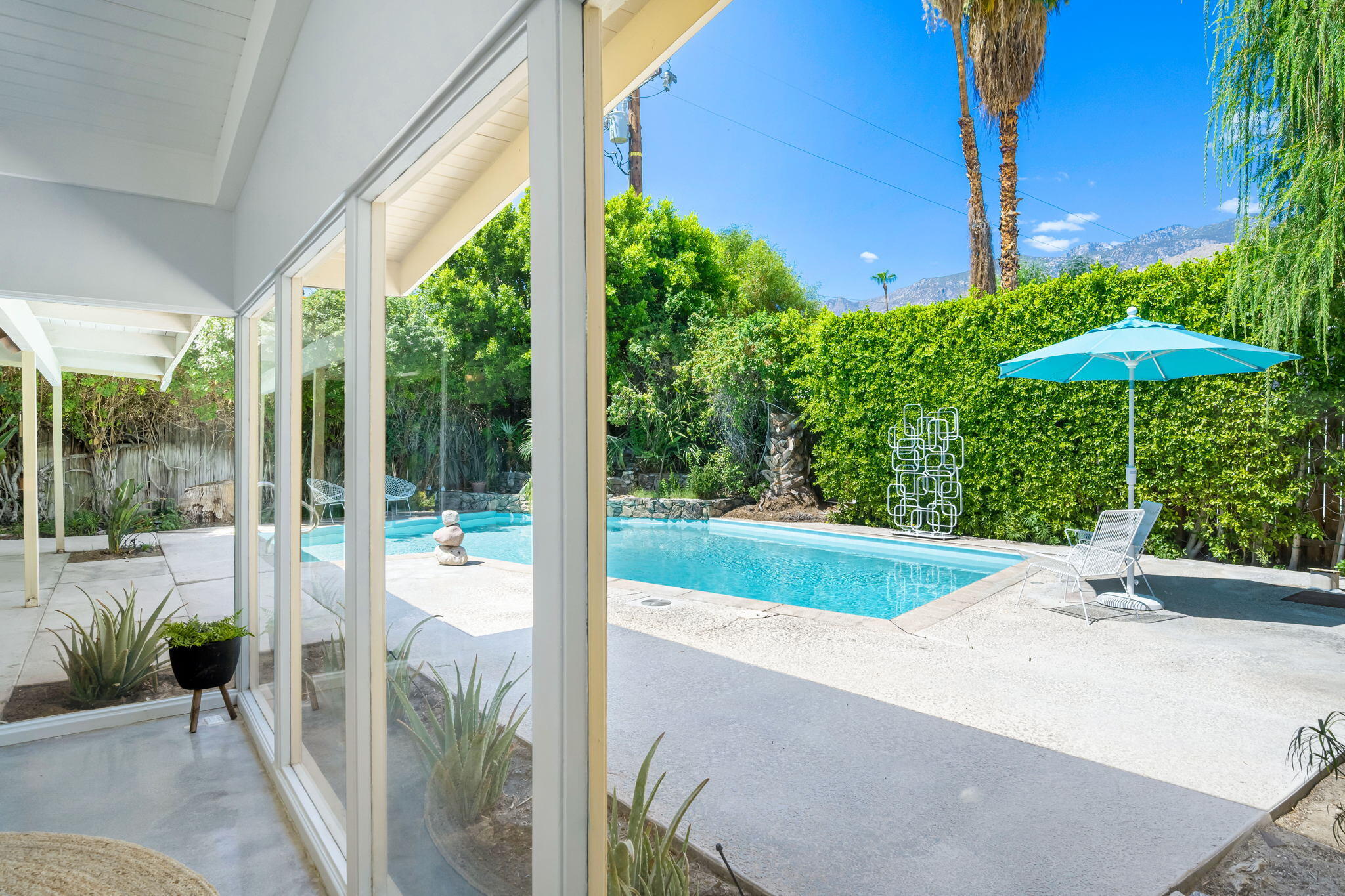 1333 East Deepwell Road Palm Springs, CA 92264 - Photo 14 of 44 a house view with a garden space