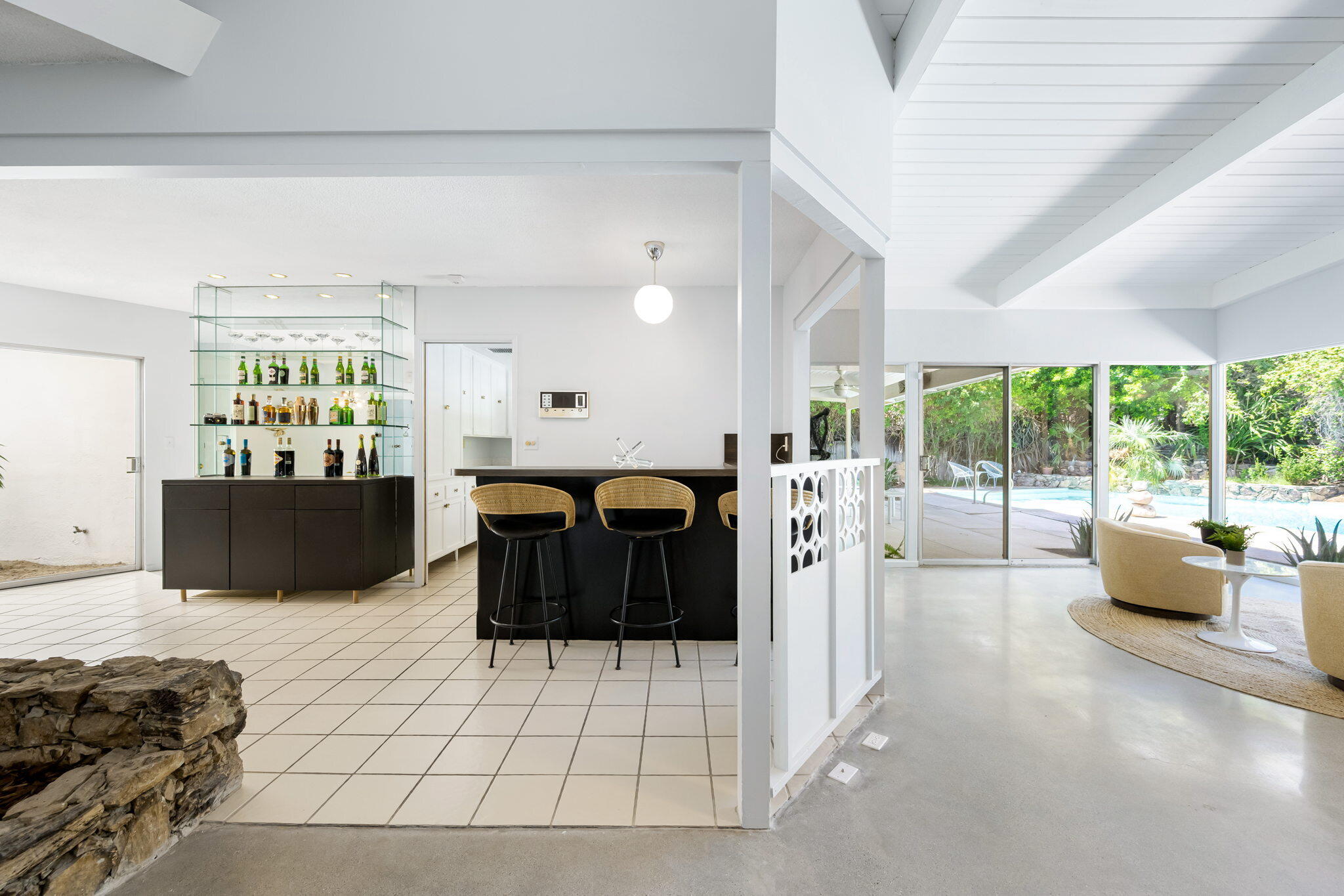 1333 East Deepwell Road Palm Springs, CA 92264 - Photo 22 of 44 a bedroom with furniture and large windows