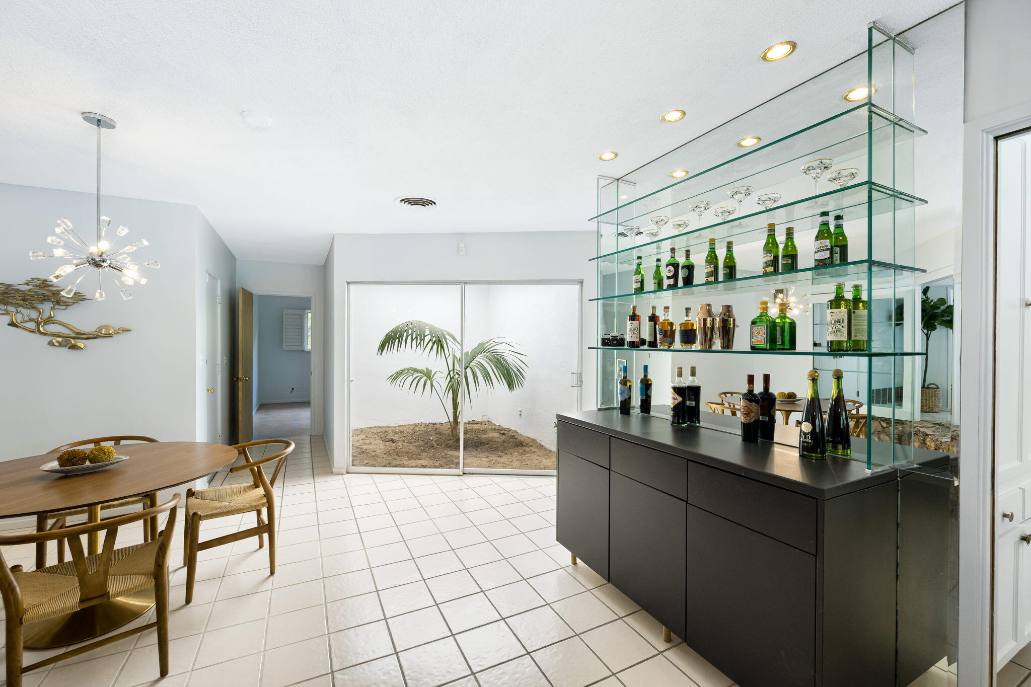 1333 East Deepwell Road Palm Springs, CA 92264 - Photo 24 of 44 a dining room with furniture and a floor to ceiling window