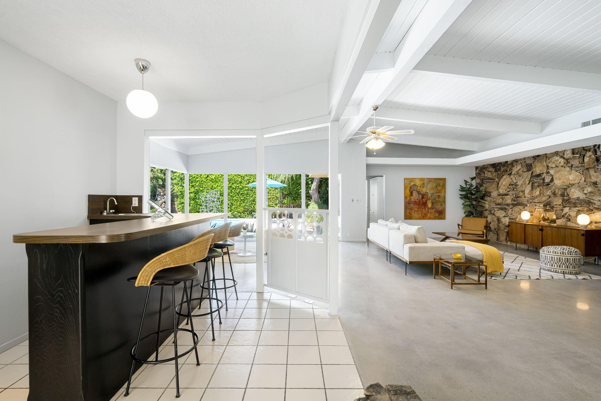 1333 East Deepwell Road Palm Springs, CA 92264 - Photo 25 of 44 a living room with furniture and a large window