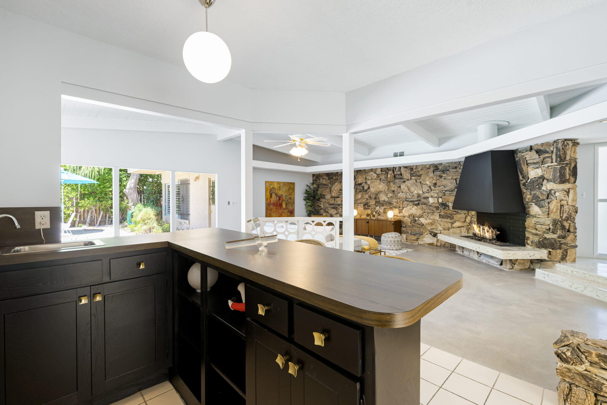 1333 East Deepwell Road Palm Springs, CA 92264 - Photo 26 of 44 a kitchen with a sink appliances and a counter top space
