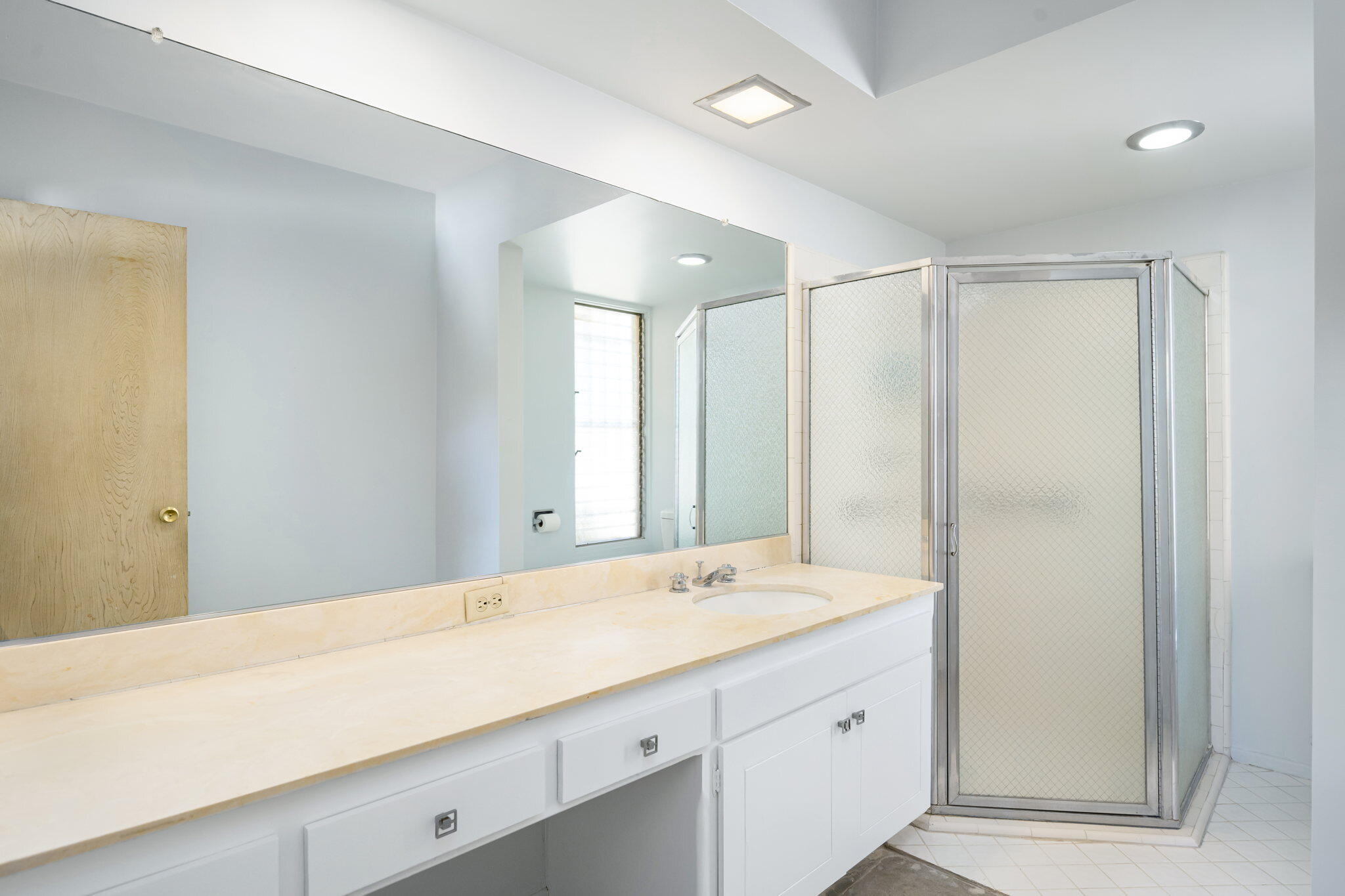 1333 East Deepwell Road Palm Springs, CA 92264 - Photo 37 of 44 a bathroom with a double vanity sink and a large mirror
