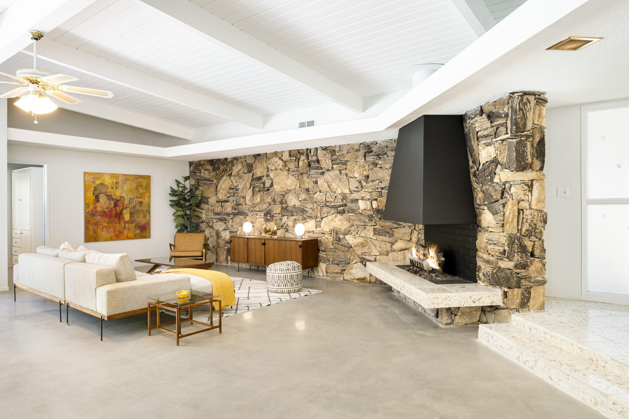 1333 East Deepwell Road Palm Springs, CA 92264 - Photo 4 of 44 a living room with furniture and a large window