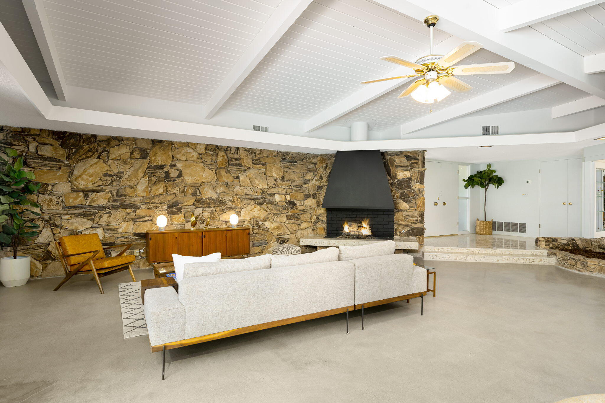 1333 East Deepwell Road Palm Springs, CA 92264 - Photo 6 of 44 a living room with furniture and a fireplace