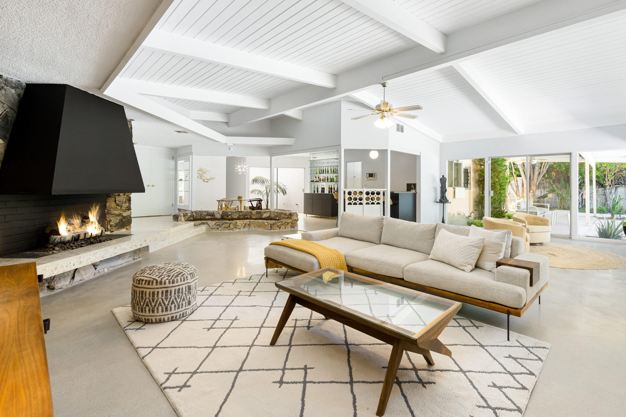 1333 East Deepwell Road Palm Springs, CA 92264 - Photo 7 of 44 a living room with furniture and a fireplace